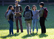 small group of students converse at mission bay campus event